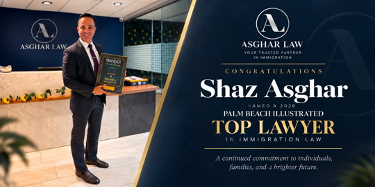 Shaz Asghar holding his 2026 Palm Beach Illustrated  Top Lawyer in Immigration Law Recognition